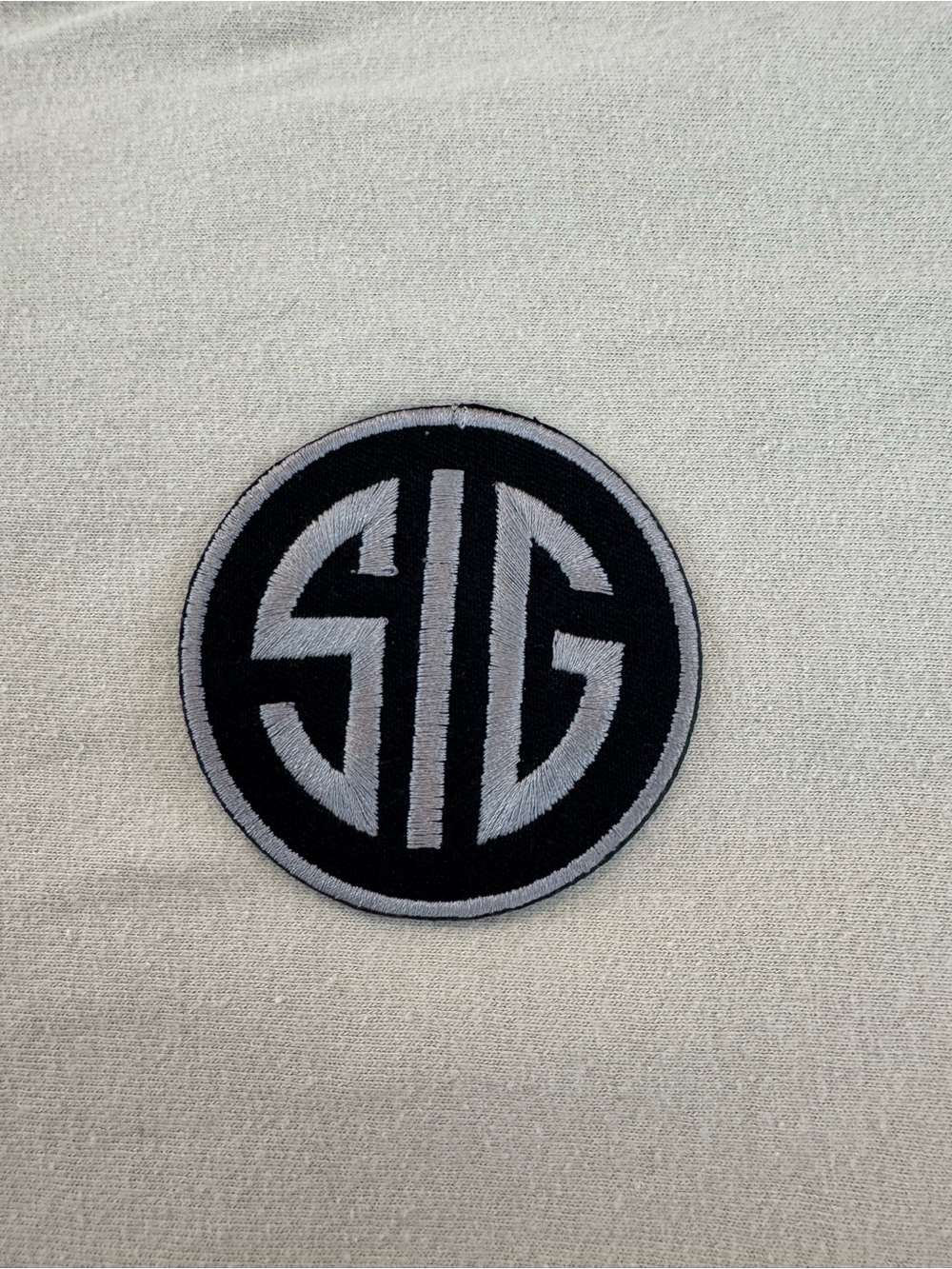 Embroidered SIG logo Round Iron on Patch - Men Accessories